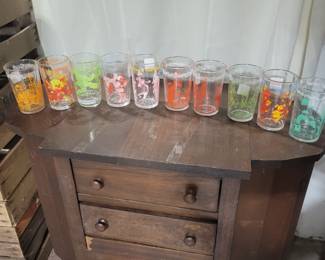 Glass collection on a Sewing Cabinet