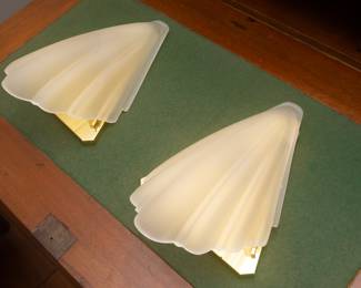 One sconce is sold. One available.