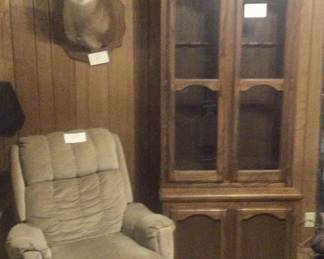 Recliner, deer mount, gun cabinet