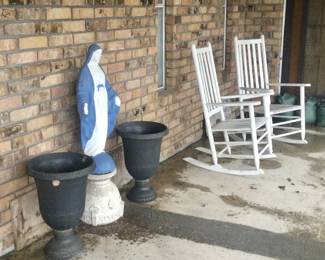 Porch rockers, blessed mother statue, flower pots