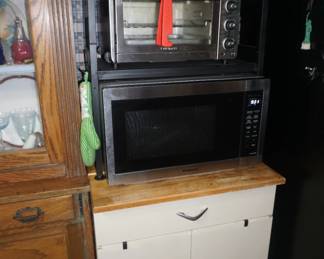 toaster oven, microwave, cabinet