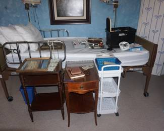 hospital bed, small tables
