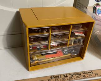 case filled with sewing notions