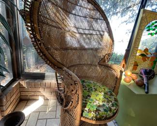 Peacock chair in beautiful condition with original bark cloth cushion