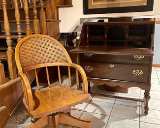 Gorgeous MCM Oak Barrister Chair. 
Cane back with Toothpick Spindles. 
Rolling, Swivel, and Rock
Ethan Allen Vintage drop-down writing desk 