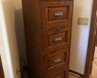 Oak file cabinet, locking drawers with key 