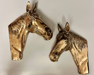 Very old c. Early 60’s brass hanging horse heads
