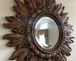 Sunburst accent mirror with crackled bronzed finish