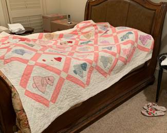 Queen bed and vintage quilt