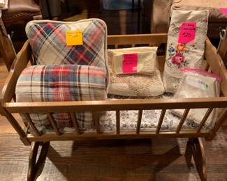 Vintage cradle, linens