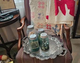 Armchair, Antique bottles with Misc Objects , hand Made Quilts