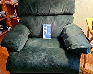As new Lazyboy dark green Recliner in Suede.