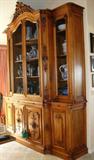 Beautiful mid 19th century walnut French Bibliotheque. Four upper grilled doors and four lower solid doors. Three reading drawers. Style Regence. From Lyon, France. 9' 11"high; 7'6" wide; 24" deep.