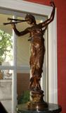 Bronze statue. Signed Eugene Marioton. 32"