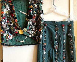 Vintage button collection sewn to vest and shirt