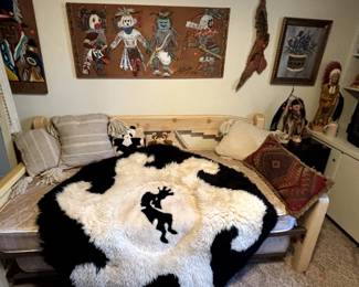 Southwestern style futon, kokopelli rug, Indian themed wall art