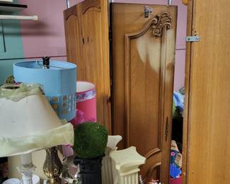 2 ornate clothing racks.