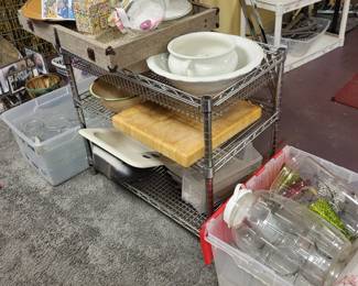 Metal ulility stand and various new and vintage glass Jars and dishes. Cutting board.