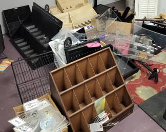 Many wodd and acrylic divider racks for cards, incense.