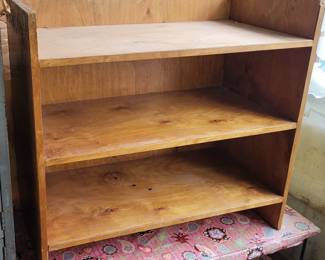 Vintage book or storage shelf. 
