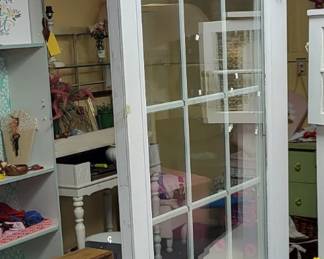 Tall white divider Window style with feet on bottom.