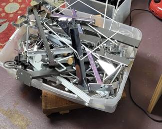 Tons of chrome and white slat and gridwall hooks , arms and various 
attachable fixtures.