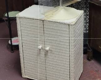 Small vintage floor cabinet wicker.