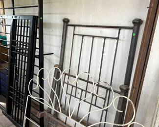 New black frame Full size bed $30. Old brass twin bed frame $50