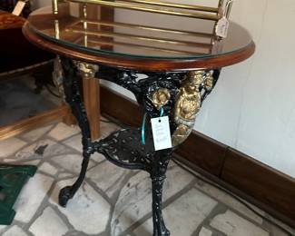cast iron table with wood top and glass top