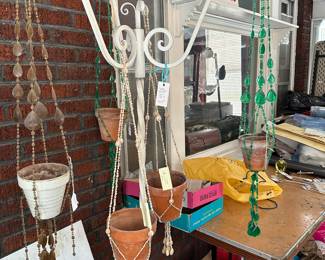cast iron standing plant stand (or whatever you want to hang from it)