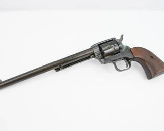 The Colt Buntline Special was a long-barreled variant of the Colt Single Action Army revolver, which Stuart N. Lake described in his best-selling but largely fictionalized 1931 biography, Wyatt Earp: Frontier Marshal. The serial number indicates this was made in 1959 and was the first Frontier buntline scout model. Featuring a 9.5 inch barrel chambered in 22LR. This Revolver is in excellent condition showing normal signs of use and wear. 