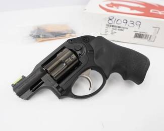 Ruger's LCR is a lightweight, small-frame revolver with a uniquely smooth trigger and highly manageable recoil. It features a monolithic frame with a grip peg allowing for use of a variety of grip styles, and an extensively fluted, high-strength stainless steel cylinder with a PVD finish for excellent durability. The patented, friction-reducing cam is a next generation design in fire control systems resulting in a smooth, non-stacking trigger pull. Its patented, polymer fire control housing holds the fire control components in their proper dimensional relationships, reduces weight significantly, and helps reduce recoil. LCR revolvers have a replaceable, pinned ramp front sight with white bar and an integral u-notch rear sight. LCR double action only revolvers have a 1.87" barrel excellent for concealed carry and are fitted with a Hogue Tamer Monogrip. This revolver comes with a box and a holster. This revolver is in excellent condition showing normal signs of use and wear. 