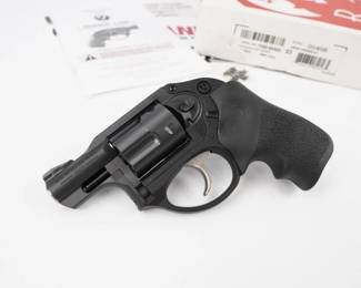 Ruger's LCR is a lightweight, small-frame revolver with a uniquely smooth trigger and highly manageable recoil. It features a monolithic frame with a grip peg allowing for use of a variety of grip styles, and an extensively fluted, high-strength stainless steel cylinder with a PVD finish for excellent durability. The patented, friction-reducing cam is a next generation design in fire control systems resulting in a smooth, non-stacking trigger pull. Its patented, polymer fire control housing holds the fire control components in their proper dimensional relationships, reduces weight significantly, and helps reduce recoil. LCR revolvers have a replaceable, pinned ramp front sight with white bar and an integral u-notch rear sight. LCR double action only revolvers have a 1.87" barrel excellent for concealed carry. Comes with the original box. This pistol is in excellent condition showing normal signs of use and wear.