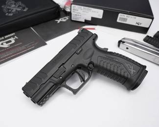 The Springfield Armory XDm Elite packs all the advanced features of the Elite line into a well-balanced and extremely capable package. Featuring the Match Enhanced Trigger Assembly (META) — delivering the finest production polymer-framed pistol trigger pull available, ambidextrous slide stop, improved slide serrations and an increased magazine of 20+1 (working in concert with a removable “short” extended and flared magwell), the XD-M Elite 4.5" offers you a handgun ready to serve. The pistol is new in the box, and comes with two magazines.