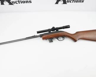 The Marlin Model 70P, also known as the Marlin Papoose, is a .22 Long Rifle semi-automatic rifle manufactured by Marlin Firearms. The rifle is notable for its portability; it is less than 21 inches (530 mm) in length when disassembled and weighs 3.25 pounds. It is designed as a hiker and camper utility rifle, and appeals to the same market as the AR-7. The Model 70P is based on the earlier Marlin Model 70 (currently listed as Model 795) that has a fixed barrel and conventional stock. Its semi-automatic action originated with the Marlin Model 60. This Rifle is in excellent condition showing normal signs of use and wear. 