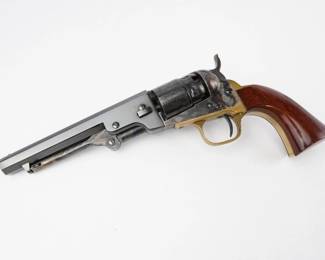 Produced from 1851-1872, the Navy Black Powder Revolver is the most famous of the cap and ball revolvers. It is perfectly balanced, has precise aim and is dependable. These guns symbolize the days of the stagecoach, Pony Express and Civil War. This A. Uberti features a steel frame, 6-shot cylinder, fixed sights and one-piece walnut grip. The revolver, chambered in .36 BP, is in like new condition and comes with the factory box.
