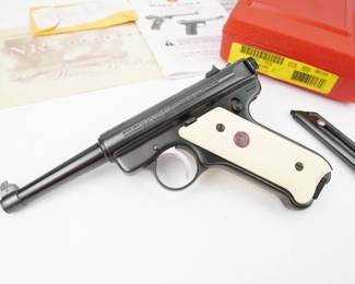 This Ruger Mark II NRA is a commemorative handgun that salutes the William B. Ruger Endowment on behalf of the NRA Foundation. Paying homage to Mr. Ruger through his favorite firearm, this Mark II is chambered in 22 LR and features William B. Ruger’s signature rollmarked on the receiver just above the bolt. The Ruger crest, which has the NRA logo incorporated into the design, is also rollmarked on the top front portion of the receiver. Red Ruger logo medallion inserts brightly show against the checkered ivory-colored grips of this specially-designed pistol. Ruger Mark II NRA Edition .22LR, 4.75 Barrel . This pistol is in perfect condition and would make a great addition to a collection. Comes with two mags and the ORIGINAL NRA red box.
