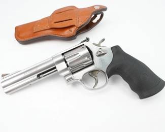 Designed with a large frame, the Smith & Wesson 629 Classic .44 Remington Magnum Revolver features satin-finished, stainless-steel construction with a 6.5-inch barrel, a synthetic grip and an exposed hammer. Ramp front and adjustable rear sights. Accepts both .44 Magnum cartridges and .44 S&W Special rounds. This double action revolver is in excellent condition, showing normal signs of use and wear.