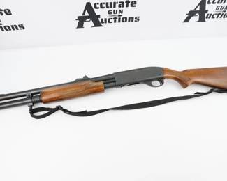 This Remington 870 Express Magnum is a 12 gauge pump action shotgun. It features a 20in barrel, full length tube fed magazine, fixed front and rear sights, and a trigger guard safety. The shotgun is in excellent condition showing normal signs of use and wear. 