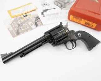 Sturm, Ruger & Company, Inc. is proud to announce the introduction of a special limited edition 50th Anniversary New Model Super Blackhawk® revolver. The blued, limited edition .44 Magnum single-action revolver joins the ranks of the 50th Year Ruger .357 and .44 Magnum Commemorative Blackhawk New Model single-action revolvers issued in 2005 and 2006, respectively. The Ruger 50th Anniversary New Model Blackhawk features the strong Ruger single-action cylinder frame with precision click adjustable rear sight, an unfluted cylinder, and checkered wood grips. The alloy steel frame, cylinder with two gold bands, and barrel wear a high gloss blue finish. This Revolver is in Excellent condition. 