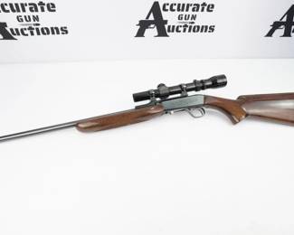 The Browning 22 Semi-Auto rifle, also known as the Semi Automatic 22 or SA-22, is a takedown rifle produced by FN Herstal based on a John Browning patent. The rifle is currently produced by Browning as the Semi-Auto 22. This stunning representation is in excellent condition, showing minimal signs of use and wear. The rifle is sold with a Redfield scope. 