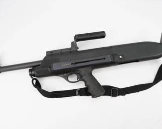 The High Standard Model Ten (HS10) is a gas operated, semi-automatic shotgun that was manufactured by the High Standard Manufacturing Company of Hamden, Connecticut. It is easily recognized by its bullpup design and rotatable shoulder/hip stock. Originally, the Model 10 was sold to law enforcement only. The concept of this shotgun was quite interesting to many police agencies who adopted the Model 10 in the late 1960s and early 1970s. Shortly later ending production. This Shotgun is in Excellent condition showing normal signs of use and wear. 