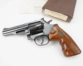 When it comes to revolvers in the US, the “Big Three” of Colt, Smith and Wesson, and Ruger remain strong. But in the 1970’s a new company emerged and attempted to challenge these three (Smith in particular) with an innovative new design. This company was Dan Wesson and the Model 15 was that design. INNOVATIVE AND POSSESSED OF EXTRAORDINARY engineering, Dan Wesson revolvers were among the most accurate sixguns ever designed and produced. Built in .357 Magnum only, the Model 15-2 reported here was both the most refined and most abundant of the line. This revolver comes with a box. This revolver is in excellent condition showing normal signs of use and wear. 