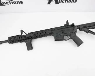 The Bushmaster XM-15 series (or XM15) is a line of AR-15 style semi-automatic rifles and carbines manufactured by Bushmaster Firearms. This XM15-E2S is chambered in .223-5.56 and features a 20 inch barrel and upgraded furniture including vertical foregrip and Troy barrel shroud. The rifle is in excellent condition, showing normal signs of use and wear, 