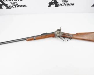 The 1859-1863 Black powder rifles were widely used in the Civil War. Taylor's & Co. is proud to offer sporting versions of the Black powder target shooter, in both the 1859 Infantry Sharps model, with a single trigger, and the 1859 Berdan Military Sharps model, with a double-set trigger. Two models of carbines are also available: the 1859 Cavalry Sharps Carbine with Patch Box, and the 1863 Cavalry Sharps Carbine without Patch Box. All models feature case-hardened frames and blue barrel finish, and are made for use with .54 caliber, paper cartridges. The 1863 Cavalry Sharps Carbine does not have a patch box, and it does have a round blue finish barrel. THis rifle is in excellent condition showing normal signs of use and wear. 