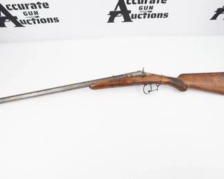 This is a Belgian Flobert-type .22 single-shot rifle with 24" octagonal barrel. Flip-up breech mechanism with ejector. The stock is one piece walnut with a beautiful grain. It has a checkered pistol grip with a round knob on the bottom of the grip This rifle is in good condition showing normal signs of use and wear. 