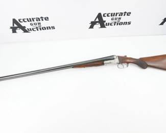 This A.H. Fox Gun Co side by side shotgun is chambered in 12 ga and features break open action. The shotgun is in good shape showing heavy signs of use and wear. 