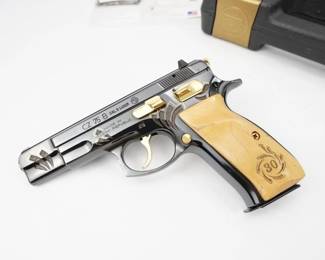 CZ 75B 9mm Luger caliber pistol. XZ?s limited edition 30th anniversary model with only 1000 made. this pistol is #126 of 1000 made. Features high gloss blued finish, engraved blonde birch wood grips, 24 karat gold inlays, 24 karat gold plated controls and special 30th anniversary engravings. The pistol is in excellent condition and is sold with a CZ case and one magazine. 