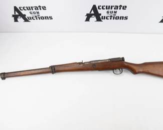 The Type 99 rifle was a bolt-action rifle of the Arisaka design used by the Imperial Japanese Army during World War II. This "Last Ditch" rifle is chambered in 7.7mm caliber, 25 5/8" barrel, blued finish, internal box magazine, "Mum" is intact, rear sight with aircraft wings, sling mounts. This rifle is in excellent condition showing normal signs of use and wear. 