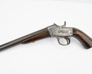 Some additional research may be required on this vintage Remington “Rolling Block” pistol. The 7” barrel is stamped with the Remington trademark and the action appears to work. 